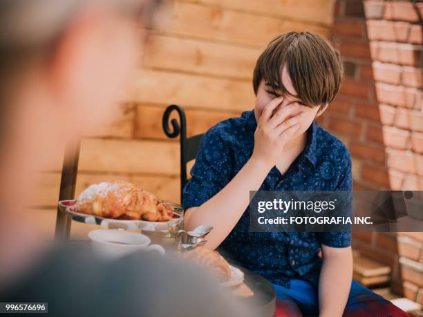 patio time with moter and son - fotografia stock pictures, royalty-free photos & images