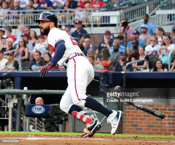 Nick Markakis of the Atlanta Braves hits an RBI double in the second inning against the Toronto Blue Jays at SunTrust Park on July 11, 2018 in...
