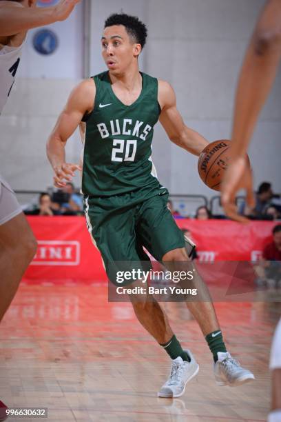 Travis Trice of the Milwaukee Bucks handles the ball against the Denver Nuggets during the 2018 Las Vegas Summer League on July 9, 2018 at the Cox...