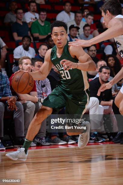 Travis Trice of the Milwaukee Bucks handles the ball against the Denver Nuggets during the 2018 Las Vegas Summer League on July 9, 2018 at the Cox...