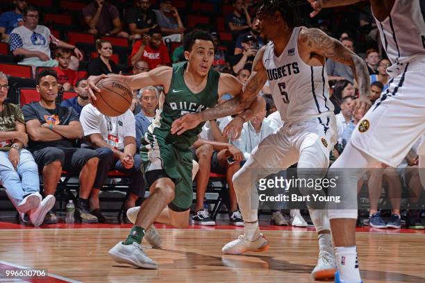 Travis Trice of the Milwaukee Bucks handles the ball against the Denver Nuggets during the 2018 Las Vegas Summer League on July 9, 2018 at the Cox...