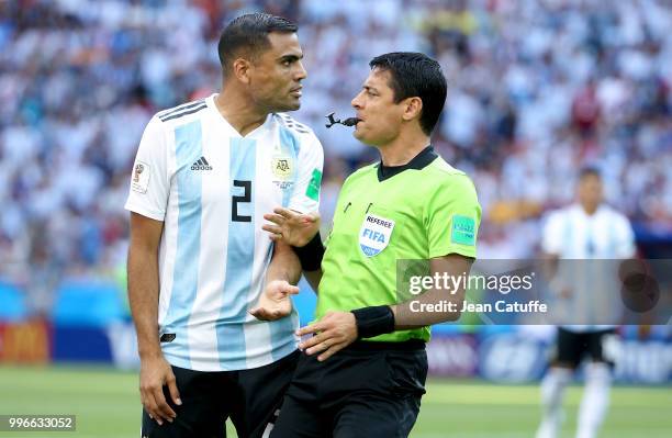 Gabriel Mercado of Argentina, referee Alireza Faghani of Iran during the 2018 FIFA World Cup Russia Round of 16 match between France and Argentina at...