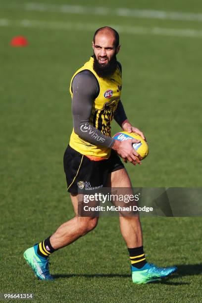 Bachar Houli of the Tigers, tipped by coach Damien Hardwick to return, looks upfield during a Richmond Tigers AFL training session at Punt Road Oval...