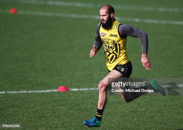 Bachar Houli of the Tigers, tipped by coach Damien Hardwick to return, runs during a Richmond Tigers AFL training session at Punt Road Oval on July...