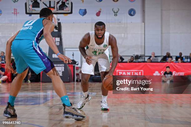 Kadeem Allen of the Boston Celtics handles the ball against the Charlotte Hornets during the 2018 Las Vegas Summer League on July 9, 2018 at the Cox...