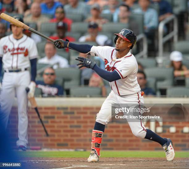 Braves infielder Ozzie Albies hits a sacrifice fly and drives in a run in the second inning during the game between Atlanta and Toronto on July 11th,...