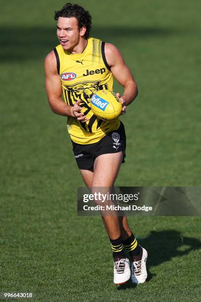 Daniel Rioli of the Tigers marks the ball during a Richmond Tigers AFL training session at Punt Road Oval on July 12, 2018 in Melbourne, Australia.