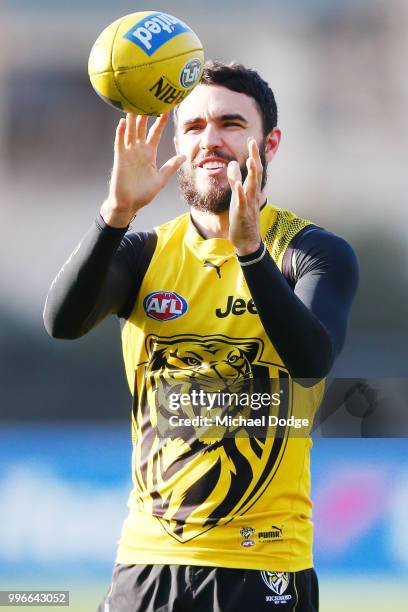 Shane Edwards of the Tigers marks the ball during a Richmond Tigers AFL training session at Punt Road Oval on July 12, 2018 in Melbourne, Australia.