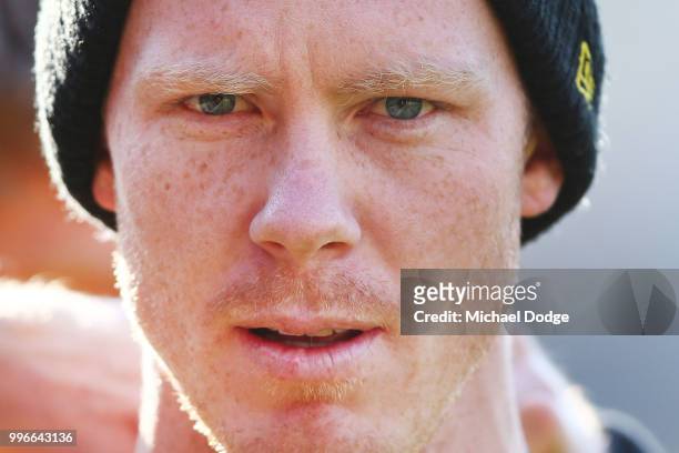 Jack Riewoldt of the Tigers playfully glares at the media cameras during a Richmond Tigers AFL training session at Punt Road Oval on July 12, 2018 in...