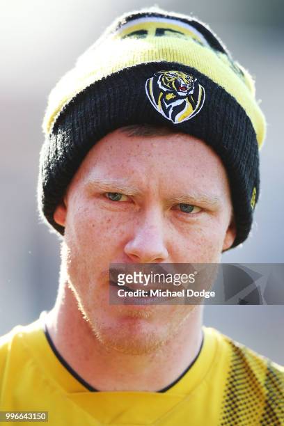 Jack Riewoldt of the Tigers playfully glares at the media cameras during a Richmond Tigers AFL training session at Punt Road Oval on July 12, 2018 in...