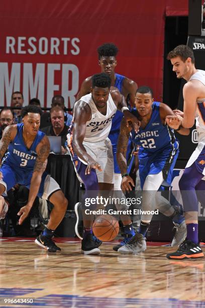 Deandre Ayton of the Phoenix Suns goes after the loose ball during the game against the Orlando Magic during the 2018 Las Vegas Summer League on July...