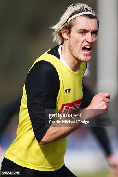 Darcy Moore of the Magpies runs upfield during a Collingwood Magpies AFL training session at the Holden Centre on July 12, 2018 in Melbourne,...