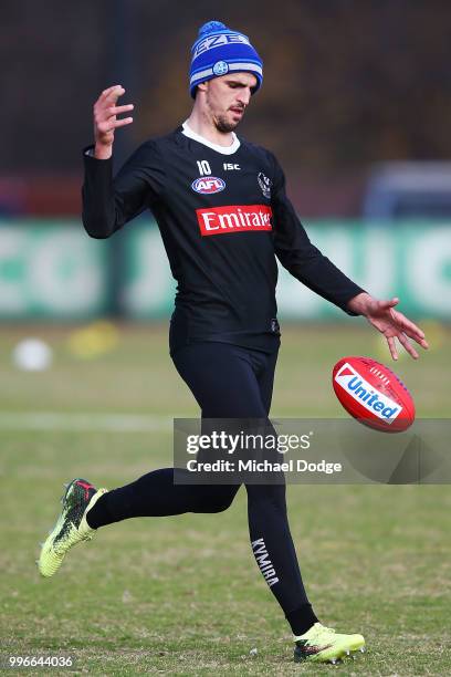 Scott Pendlebury of the Magpies kicks the ball during a Collingwood Magpies AFL press conference at the Holden Centre on July 12, 2018 in Melbourne,...