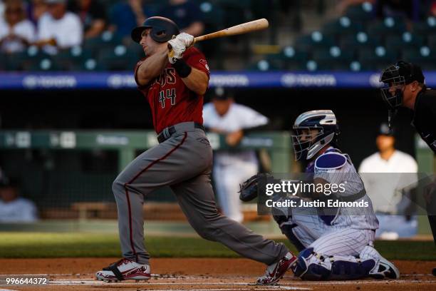 Paul Goldschmidt of the Arizona Diamondbacks hits a solo home run during the first inning against the Colorado Rockies at Coors Field on July 11,...