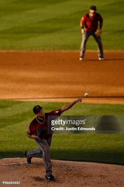 Relief pitcher Jorge De La Rosa of the Arizona Diamondbacks delivers to home plate during the second inning in the second inning against the Colorado...