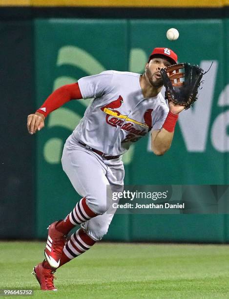 Tommy Pham of the St. Louis Cardinals makes a catch of a ball hit by Jose Abreu of the Chicago White Sox in the 6th inning at Guaranteed Rate Field...