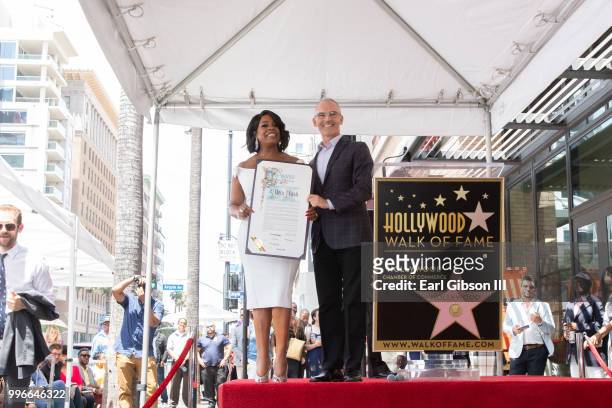 Niecy Nash and Mitch O'Farrell pose for a photo as Niecy Nash is honored with a Star On The Hollywood Walk Of Fame on July 11, 2018 in Hollywood,...