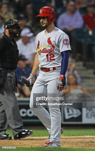 Paul DeJong of the St. Louis Cardinals walks back to the dugout after striking out in the 5th inning against the Chicago White Sox at Guaranteed Rate...