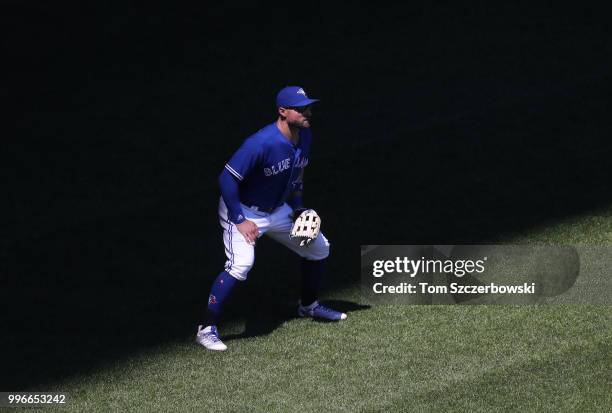 Kevin Pillar of the Toronto Blue Jays stands in center field as he gets ready to field his position during MLB game action against the New York...