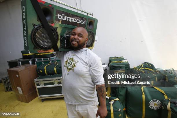 Clubbie Sean of the Oakland Athletics watches over the bags on get away day during the game against the Los Angeles Angels of Anaheim at the Oakland...