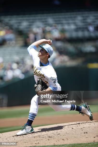 Daniel Mengden of the Oakland Athletics pitches during the game against the Los Angeles Angels of Anaheim at the Oakland Alameda Coliseum on June 17,...