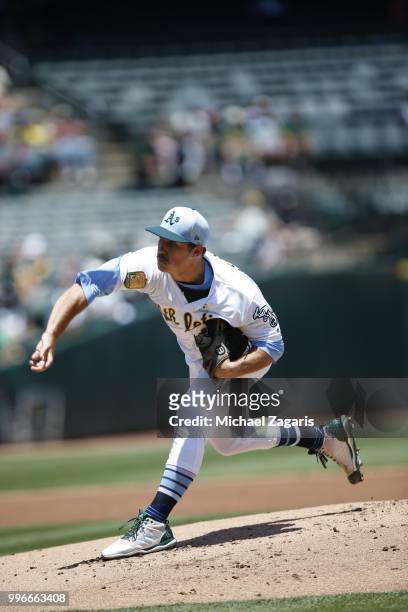 Daniel Mengden of the Oakland Athletics pitches during the game against the Los Angeles Angels of Anaheim at the Oakland Alameda Coliseum on June 17,...