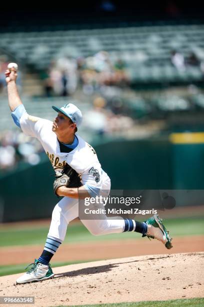 Daniel Mengden of the Oakland Athletics pitches during the game against the Los Angeles Angels of Anaheim at the Oakland Alameda Coliseum on June 17,...