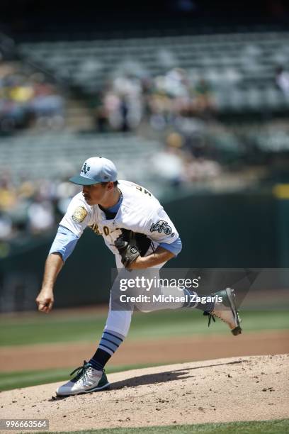 Daniel Mengden of the Oakland Athletics pitches during the game against the Los Angeles Angels of Anaheim at the Oakland Alameda Coliseum on June 17,...