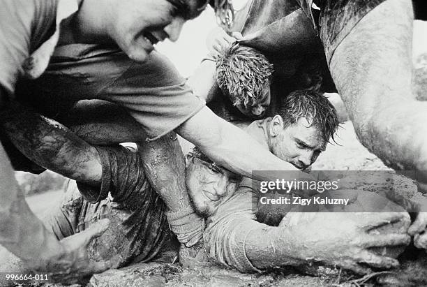 rugby union, players in the mud, close-up (b&w) - rugby union scrum stock pictures, royalty-free photos & images