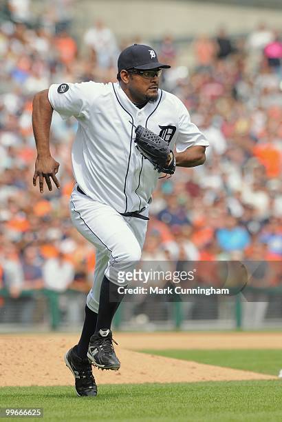 Jose Valverde of the Detroit Tigers runs to cover first base during the game against the Boston Red Sox at Comerica Park on May 16, 2010 in Detroit,...