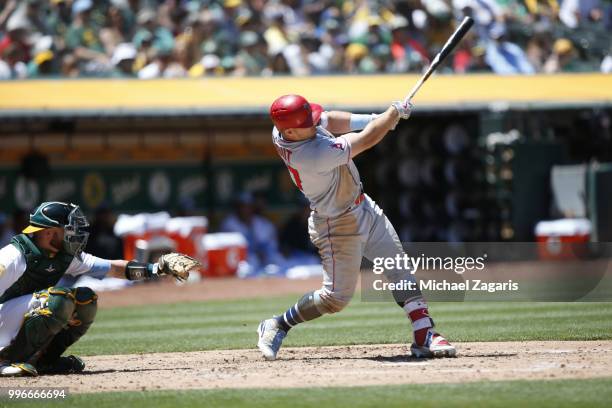 Mike Trout of the Los Angeles Angels of Anaheim bats during the game against the Oakland Athletics at the Oakland Alameda Coliseum on June 17, 2018...