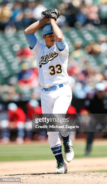 Daniel Mengden of the Oakland Athletics pitches during the game against the Los Angeles Angels of Anaheim at the Oakland Alameda Coliseum on June 17,...