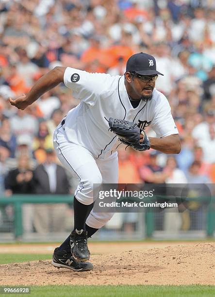 Jose Valverde of the Detroit Tigers runs to cover first base during the game against the Boston Red Sox at Comerica Park on May 16, 2010 in Detroit,...