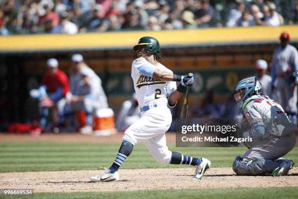 Khris Davis of the Oakland Athletics bats during the game against the Los Angeles Angels of Anaheim at the Oakland Alameda Coliseum on June 17, 2018...