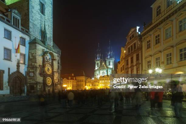 prague old town square in the night - horloge stock pictures, royalty-free photos & images