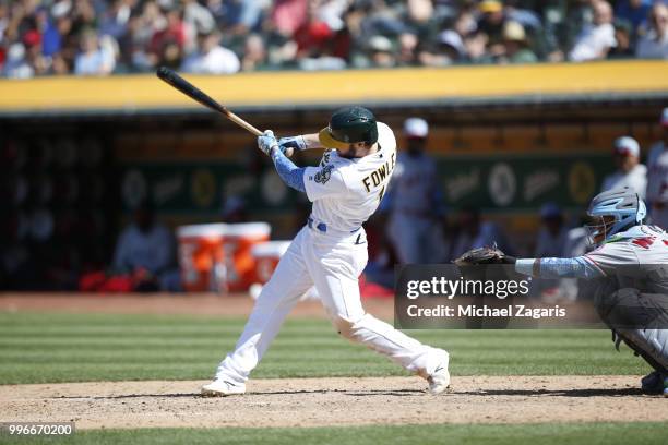 Dustin Fowler of the Oakland Athletics bats during the game against the Los Angeles Angels of Anaheim at the Oakland Alameda Coliseum on June 17,...