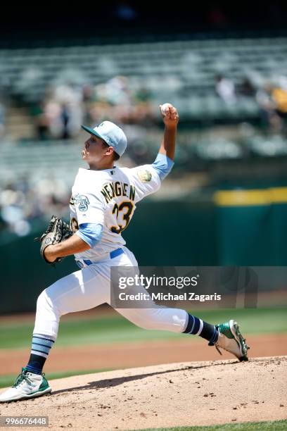 Daniel Mengden of the Oakland Athletics pitches during the game against the Los Angeles Angels of Anaheim at the Oakland Alameda Coliseum on June 17,...