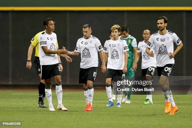 Christian Gimenez of CF Pachuca celebrates with teammates after scoring a goal in the second half against Club Leon at Miller Park on July 11, 2018...