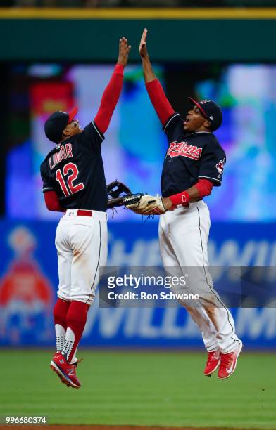 Francisco Lindor and Greg Allen of the Cleveland Indians celebrate a 19-4 victory over the Cincinnati Reds at Progressive Field on July 11, 2018 in...