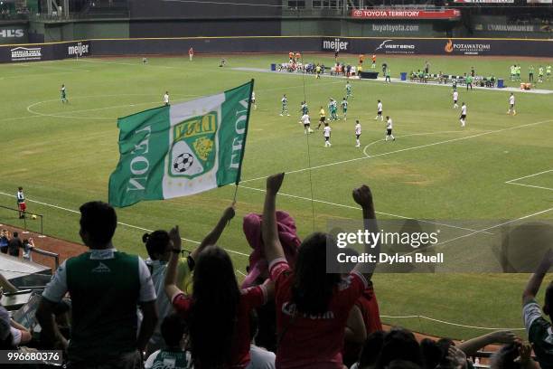 Fans celebrate after Club Leon scored a goal in the second half against CF Pachuca at Miller Park on July 11, 2018 in Milwaukee, Wisconsin.