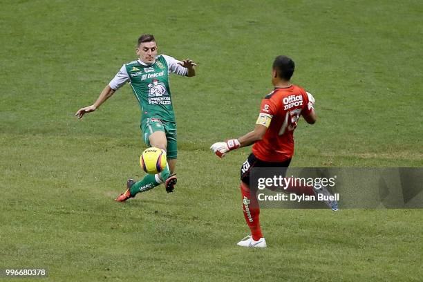Maximiliano Ceratto of Club Leon attempts a shot past Alfonso Blanco of CF Pachuca in the second half at Miller Park on July 11, 2018 in Milwaukee,...