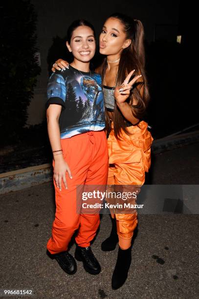 Alessia Cara and Ariana Grande pose backstage at the Amazon Music Unboxing Prime Day event on July 11, 2018 in Brooklyn, New York.
