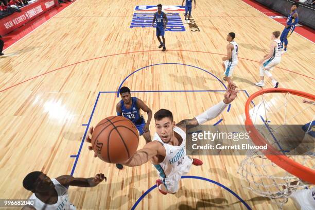 Willy Hernangomez of the Charlotte Hornets handles the ball against the Golden State Warriors during the 2018 Las Vegas Summer League on July 11,...