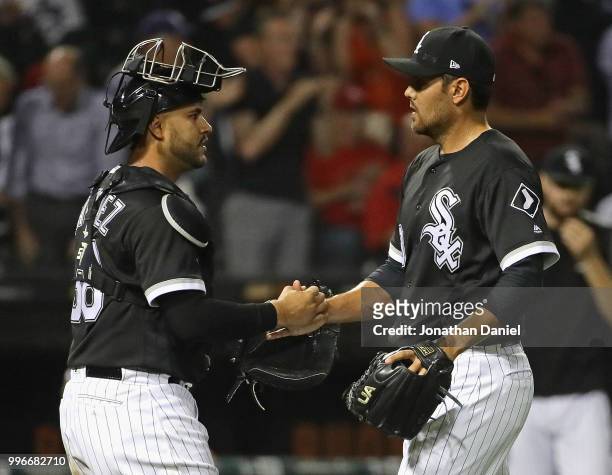 Omar Narvaez and Joakim Soria of the Chicago White Sox shake hands after a win over the St. Louis Cardinals at Guaranteed Rate Field on July 11, 2018...
