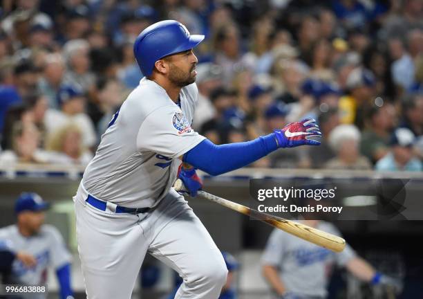 Matt Kemp of the Los Angeles Dodgers hits an RBI single during the third inning of a baseball game against the San Diego Padres at PETCO Park on July...