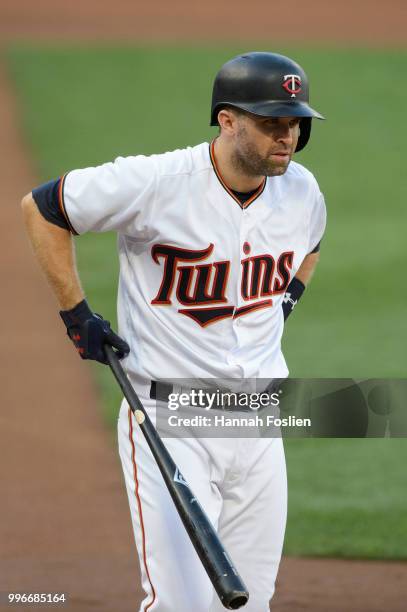 Brian Dozier of the Minnesota Twins reacts to striking out against the Kansas City Royals during the game on July 9, 2018 at Target Field in...