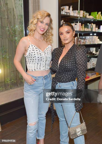 January Jones and Fajer Fahad attend Beats by Dre for VIOLET GREY Party on July 11, 2018 in Los Angeles, California.