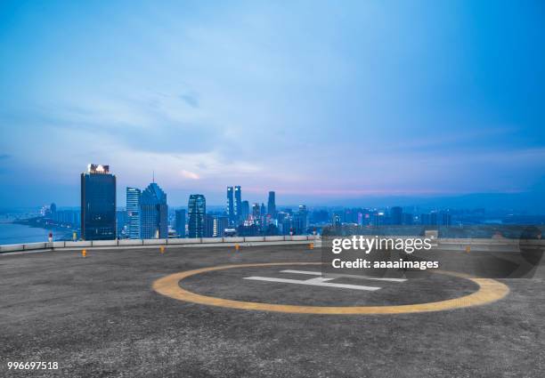 helicopter parking front of nanchang city - helikopterplatform stockfoto's en -beelden