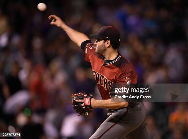 Arizona Diamondbacks pitcher Alex Avila pitching in the 7th inning against the Colorado Rockies at Coors Field July 11, 2018. Avila started the game...