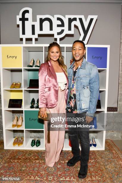 Chrissy Teigen and John Legend attend the Finery App launch party hosted by Brooklyn Decker at Microsoft Lounge on July 11, 2018 in Culver City,...